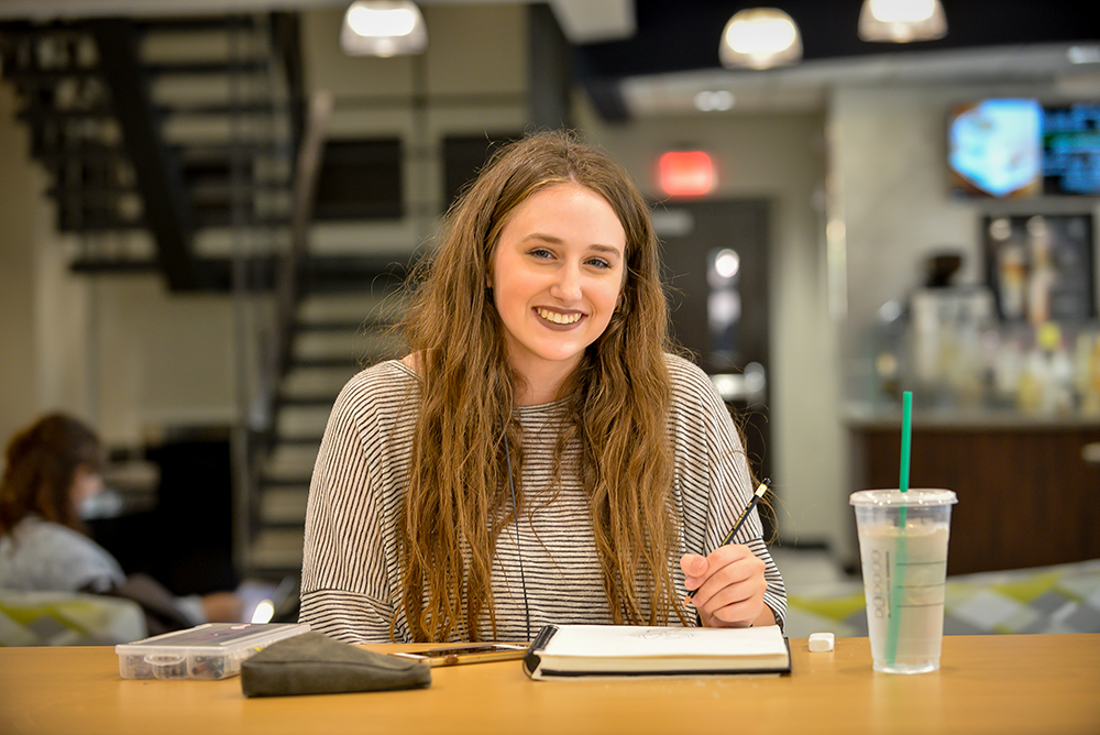 student in coffee shop